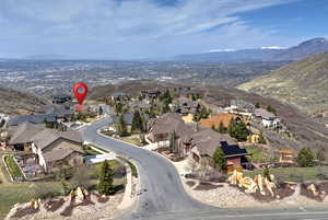 Drone / aerial view with a mountain view and a residential view