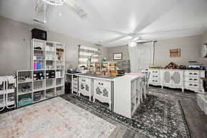 Kitchen with open shelves, ceiling fan, dark wood finished floors, and visible vents