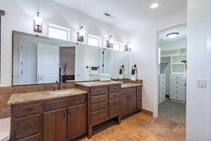 Full bathroom featuring vanity and visible vents