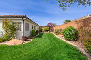 View of yard with a fenced backyard