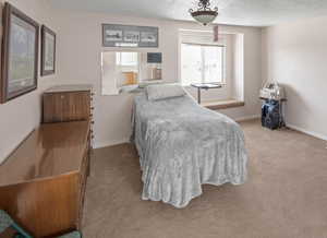 Primary bedroom with a window seat.