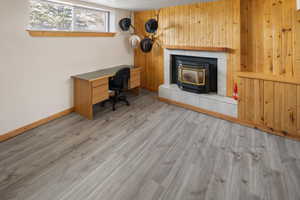 Basement family room/bedroom down with another pellet stove
