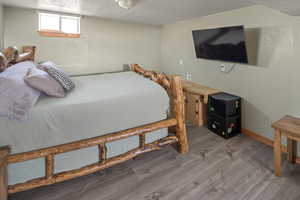 Bedroom down with LVP flooring