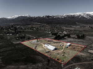 Aerial looking towards mountains with survey boundary highlighted