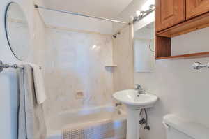 Full bath with shower / bathing tub combination and toilet
