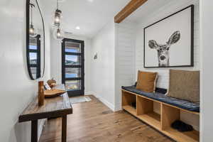 Mudroom with visible vents, baseboards, beamed ceiling, recessed lighting, and wood finished floors
