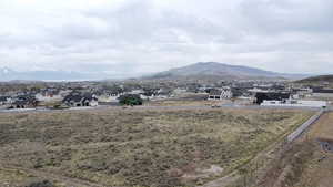 Property view of mountains featuring a residential view