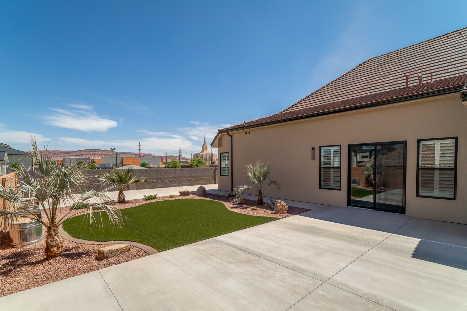 View of yard featuring a patio area and fence