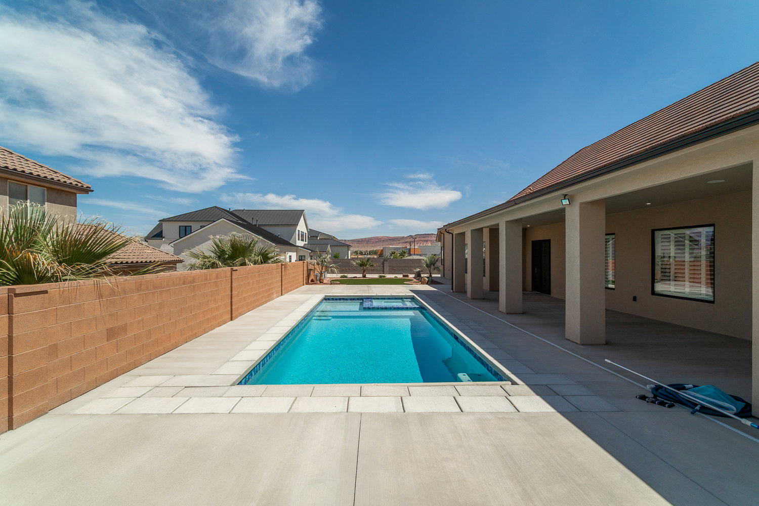 View of pool featuring a patio area, a fenced backyard, and a fenced in pool
