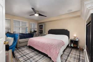 Bedroom featuring a ceiling fan