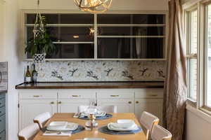 Dining area featuring a chandelier