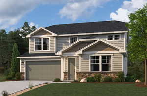 Craftsman-style home featuring a garage, driveway, stone siding, and a front lawn