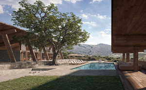 Outdoor pool featuring a patio and a mountain view