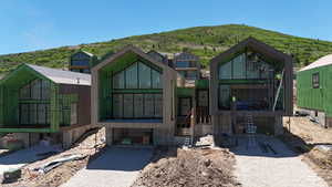 View of front of house featuring a mountain view