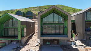 Exterior space featuring a mountain backdrop