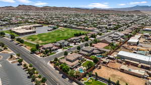 Aerial view of residential area featuring a mountain backdrop