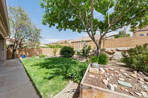 View of yard with a fenced backyard