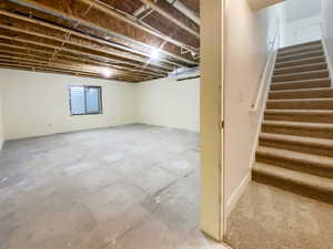 Basement featuring stairway