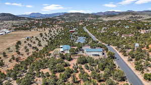 Birds eye view of property featuring a mountain view