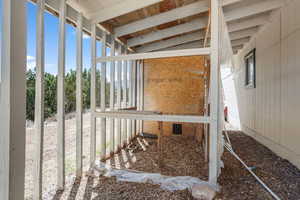 View of property exterior featuring an outdoor structure