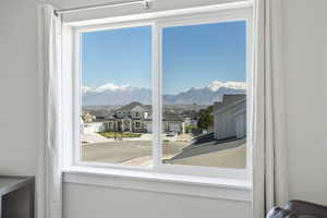 Interior space featuring a mountain view and a residential view