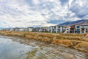 Rear view of house featuring a residential view