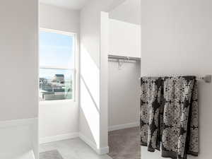 Bathroom featuring baseboards