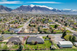 Drone / aerial view featuring a residential view and a mountain view