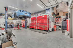 Garage featuring a workshop area