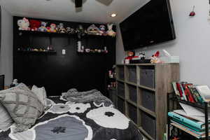Bedroom with recessed lighting and a ceiling fan