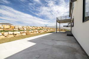 View of patio / terrace with a balcony