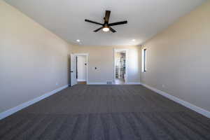 Empty room featuring visible vents, baseboards, ceiling fan, recessed lighting, and carpet flooring