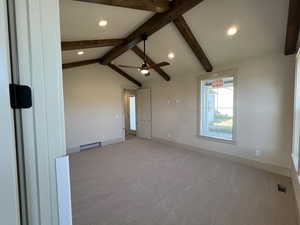 Empty room featuring recessed lighting, light colored carpet, baseboards, and a ceiling fan