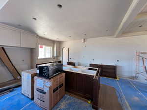 Kitchen featuring a center island,