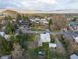 Drone / aerial view with a mountain view and a residential view