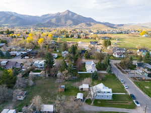 Drone / aerial view with a residential view and a mountain view