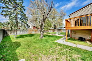 View of yard featuring a patio area and a fenced backyard