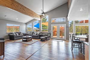Living area with baseboards, recessed lighting, French doors, ceiling fan, and wood finished floors