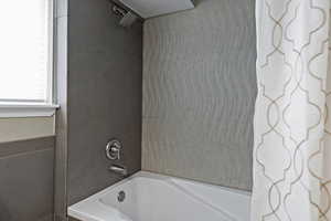 Full bath with shower / washtub combination