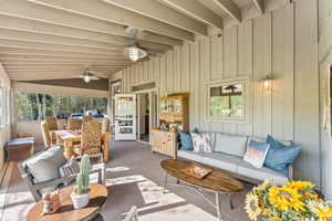 Exterior space with a ceiling fan, outdoor lounge area, and plenty of natural light
