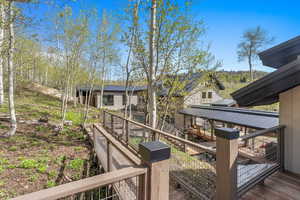 View of yard with a deck