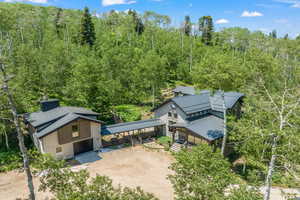 Drone / aerial view with a forest view