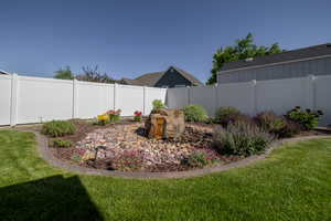 View of fenced backyard