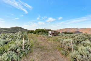Property view of mountains with a rural view