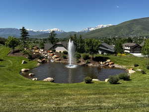 Property view of water with a mountain view