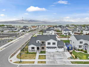 Drone / aerial view featuring a residential view and a mountain view