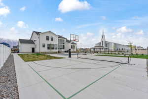 View of sport court featuring fence