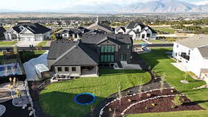 Aerial view of residential area with a mountainous background