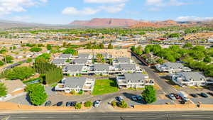 aerial view with a mountain view and a residential view