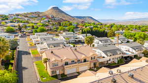 Birds eye view of property featuring a residential view and a mountain view